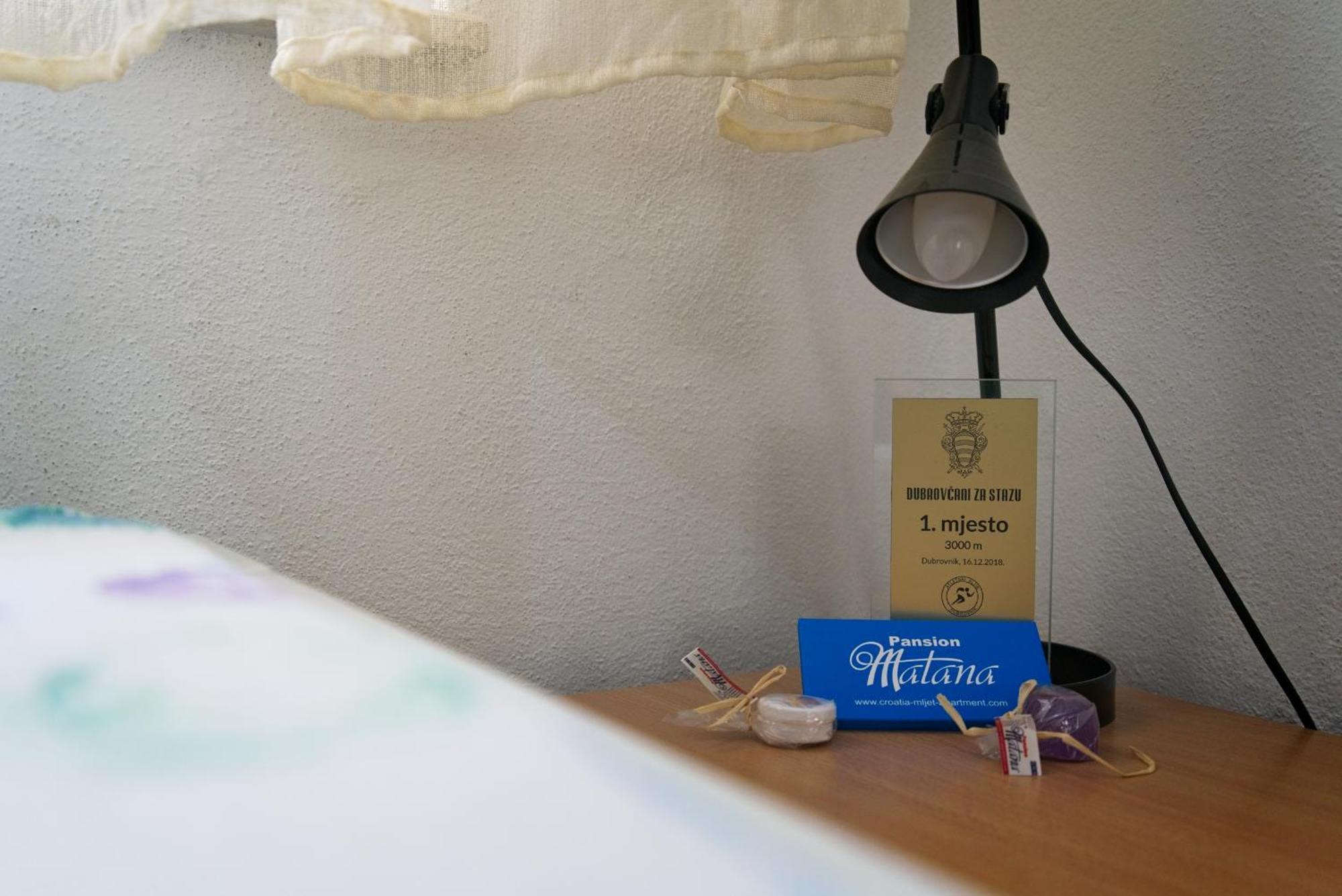 Guest House Matana Pomena Quarto foto